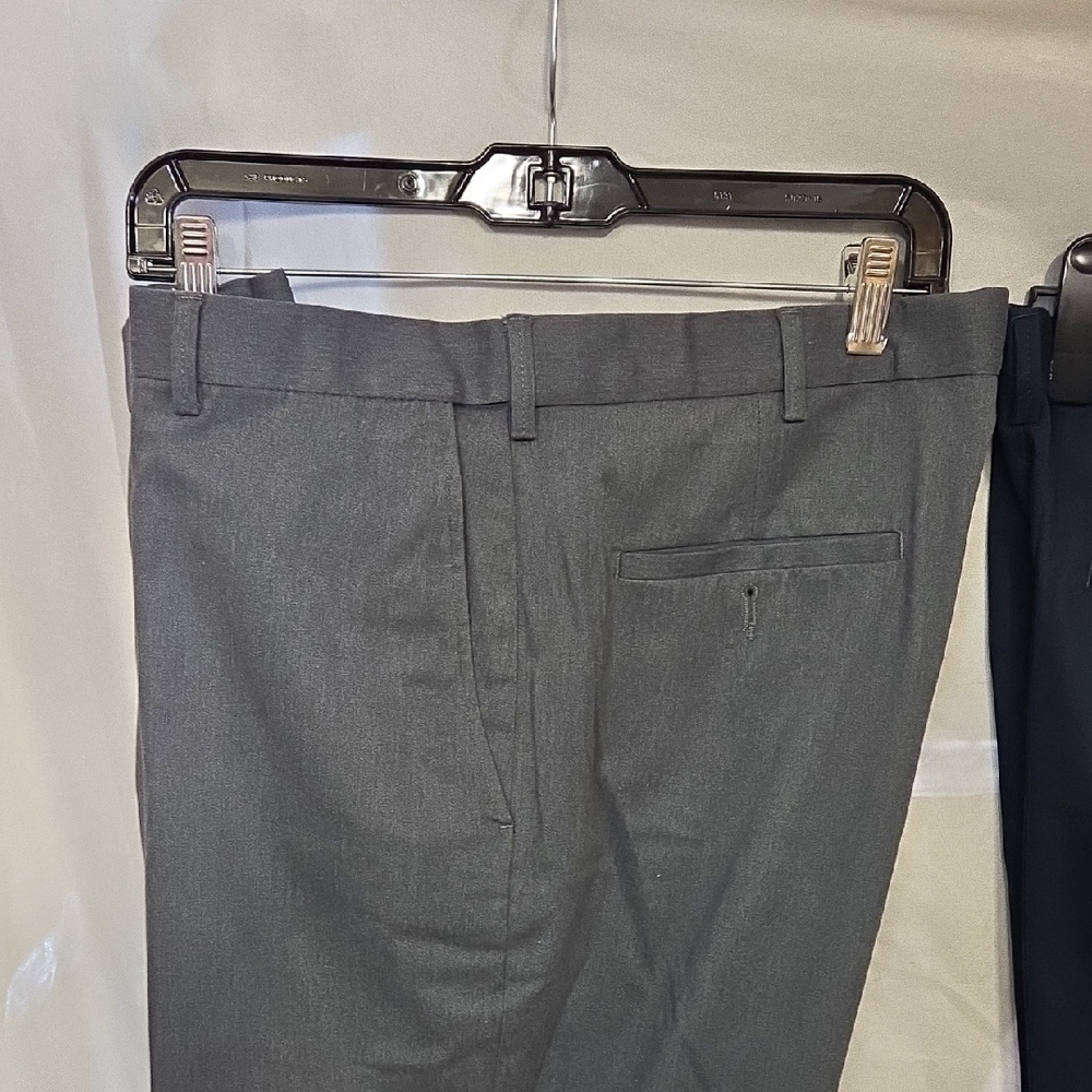 3 Pair Haggar dress pants. Available in charcoal, navy, and black. 36x29 - Picture 6 of 13